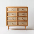 Commode 8 tiroirs bois naturel, façades en cannage, pieds cylindriques